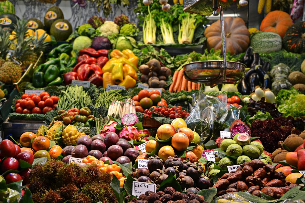 A display of fruits and vegetables, emphasizing shift to low-carbon food options.